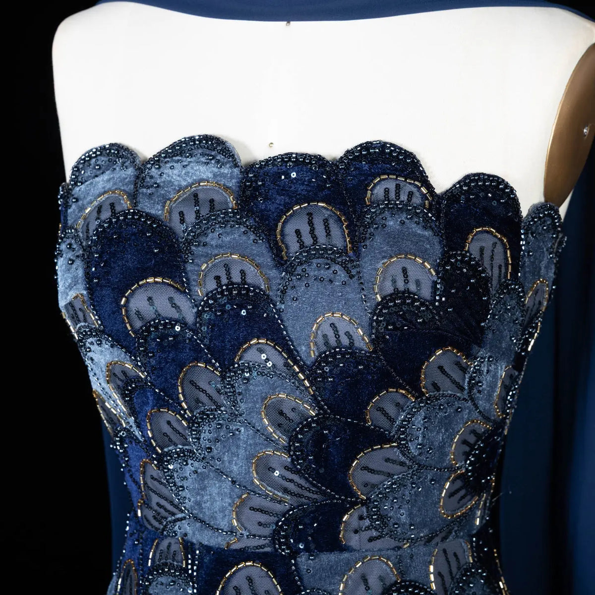 Elegant Strapless Dress with Scalloped Beadwork and Statement Cape