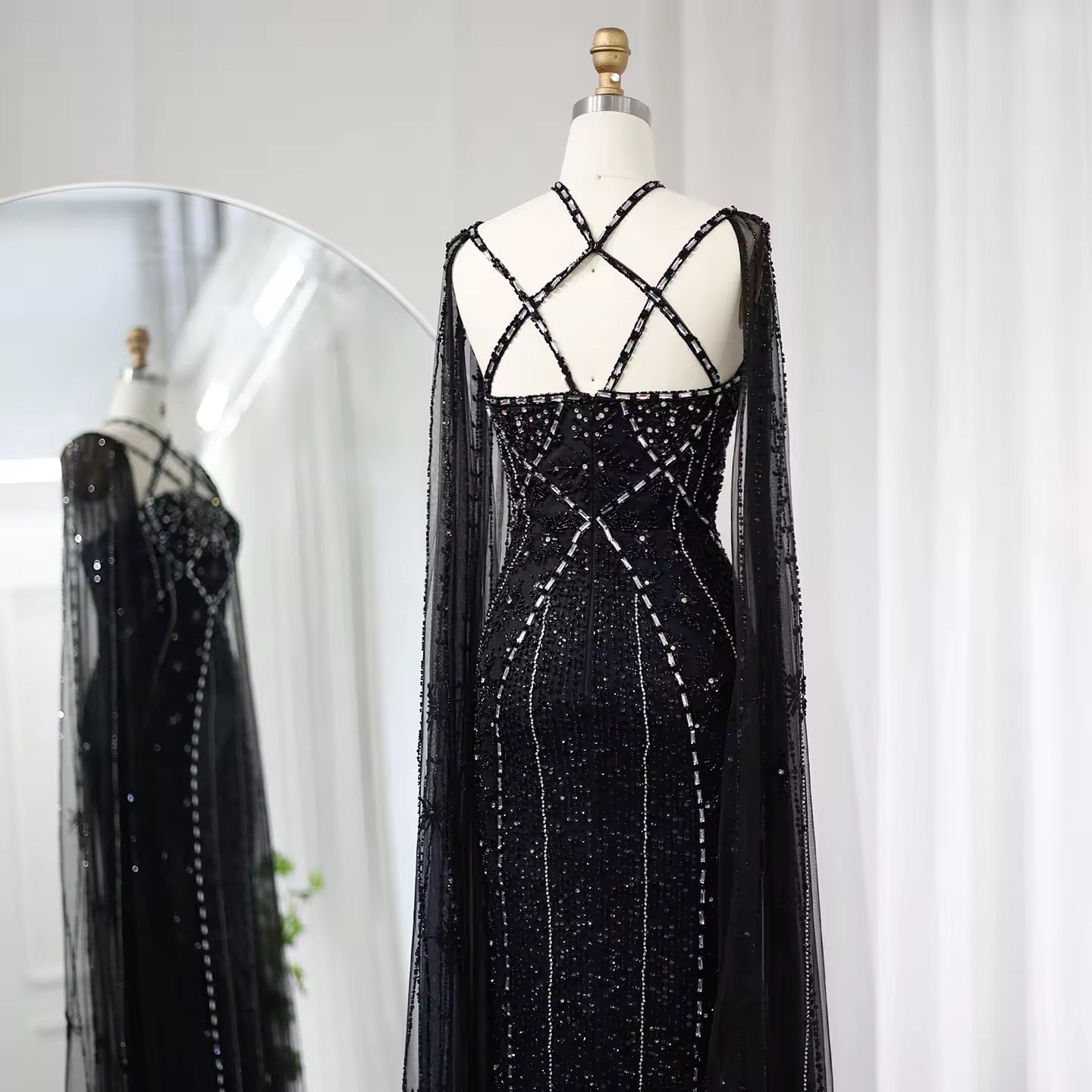Elegant Beaded Gown with Open Sleeves and Crystal Detailing