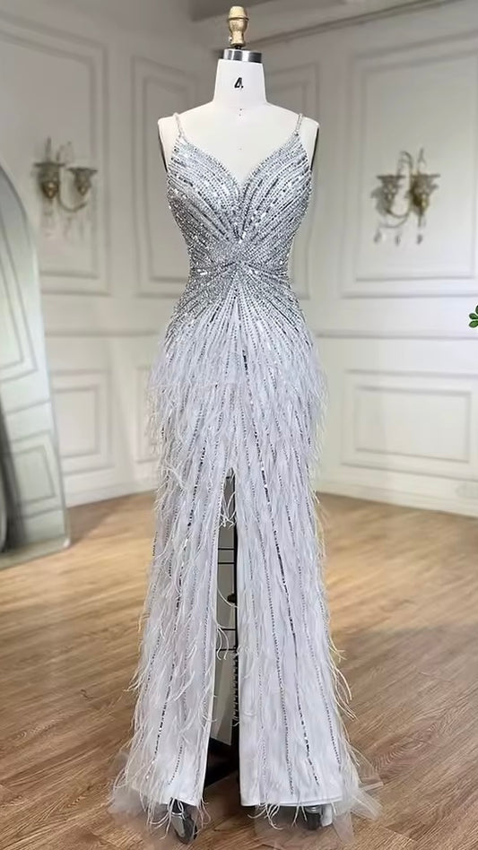 Luxury dress decorated with crystal and feathers