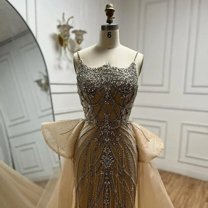 Customized 2025 Nude Saudi Beaded Spaghetti Strap Evening Dresses Gowns with Overskirt for Formal Occasion