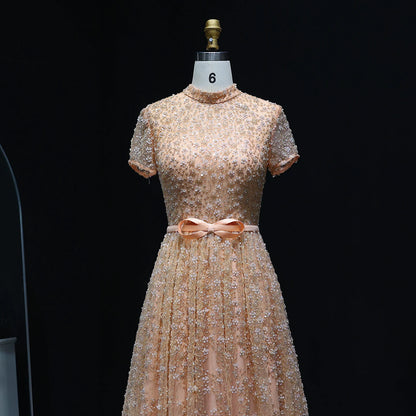 Elegant Embroidered Peach Evening Gown with Bow Luxury Beaded Dress