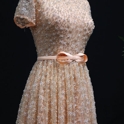 Elegant Embroidered Peach Evening Gown with Bow Luxury Beaded Dress